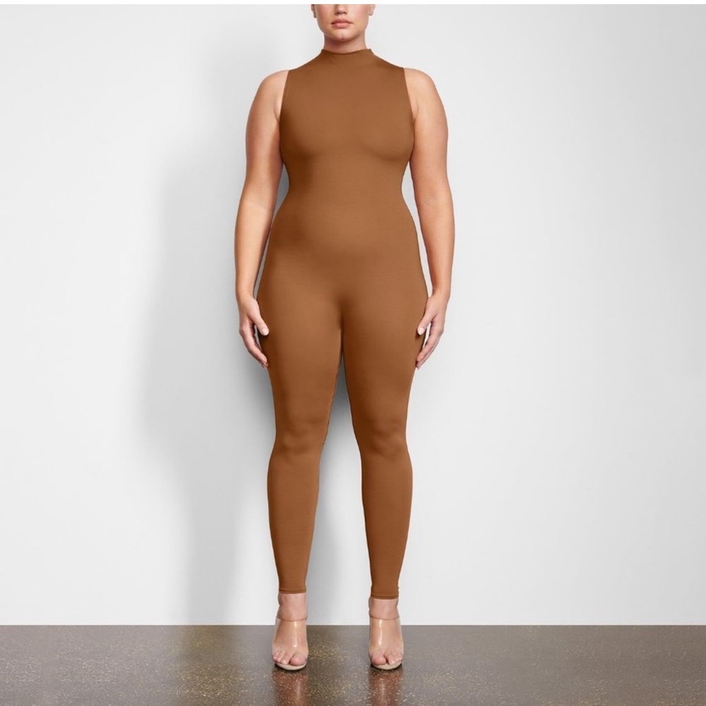 Skims ALL-IN-ONE MOCK NECK SLEEVELESS ONESIE